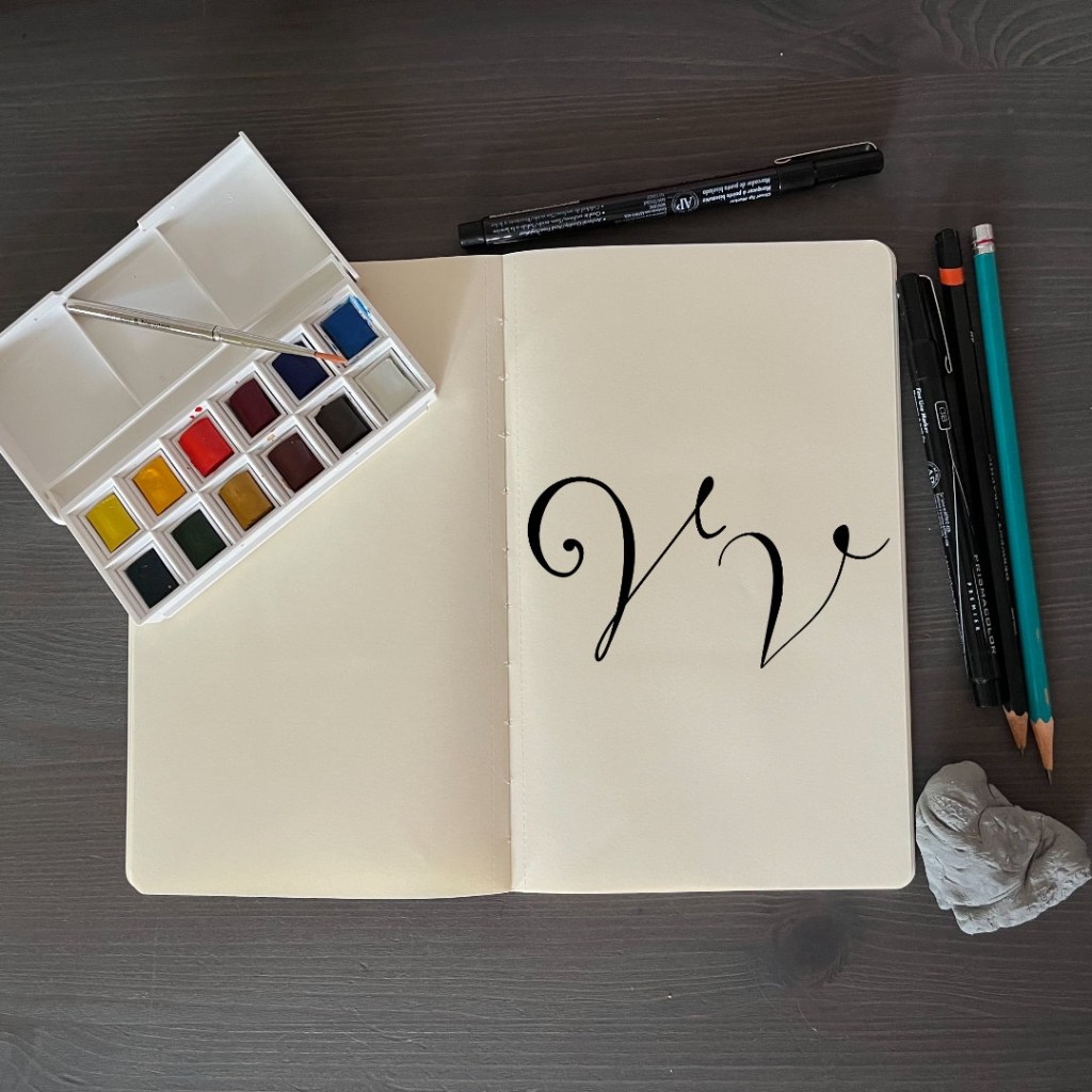 the letter Vv with an artsy background for 36 days of type