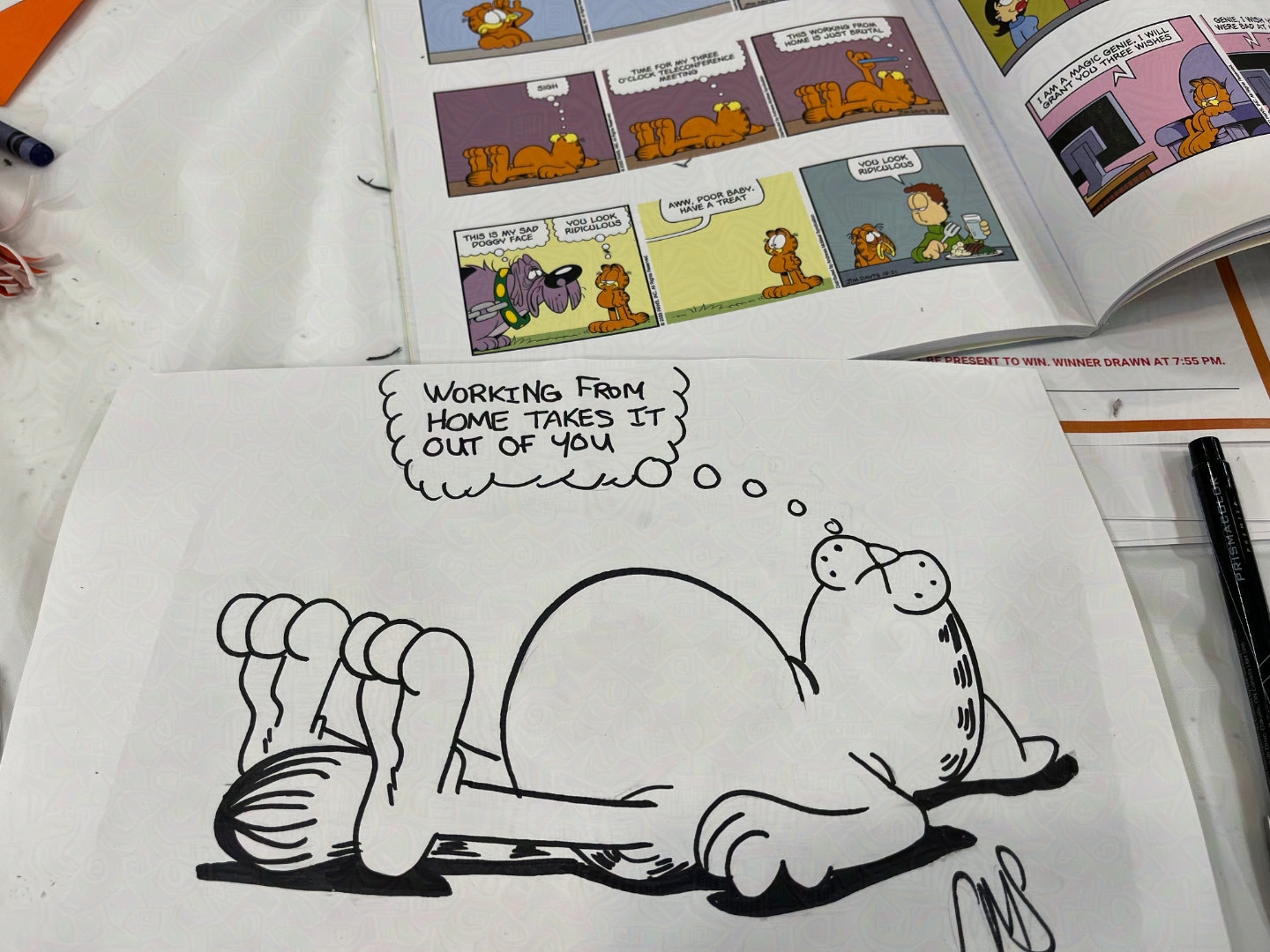 ink line drawing of garfield the cat laying down. text bubble reads "Working from home takes it out of you".