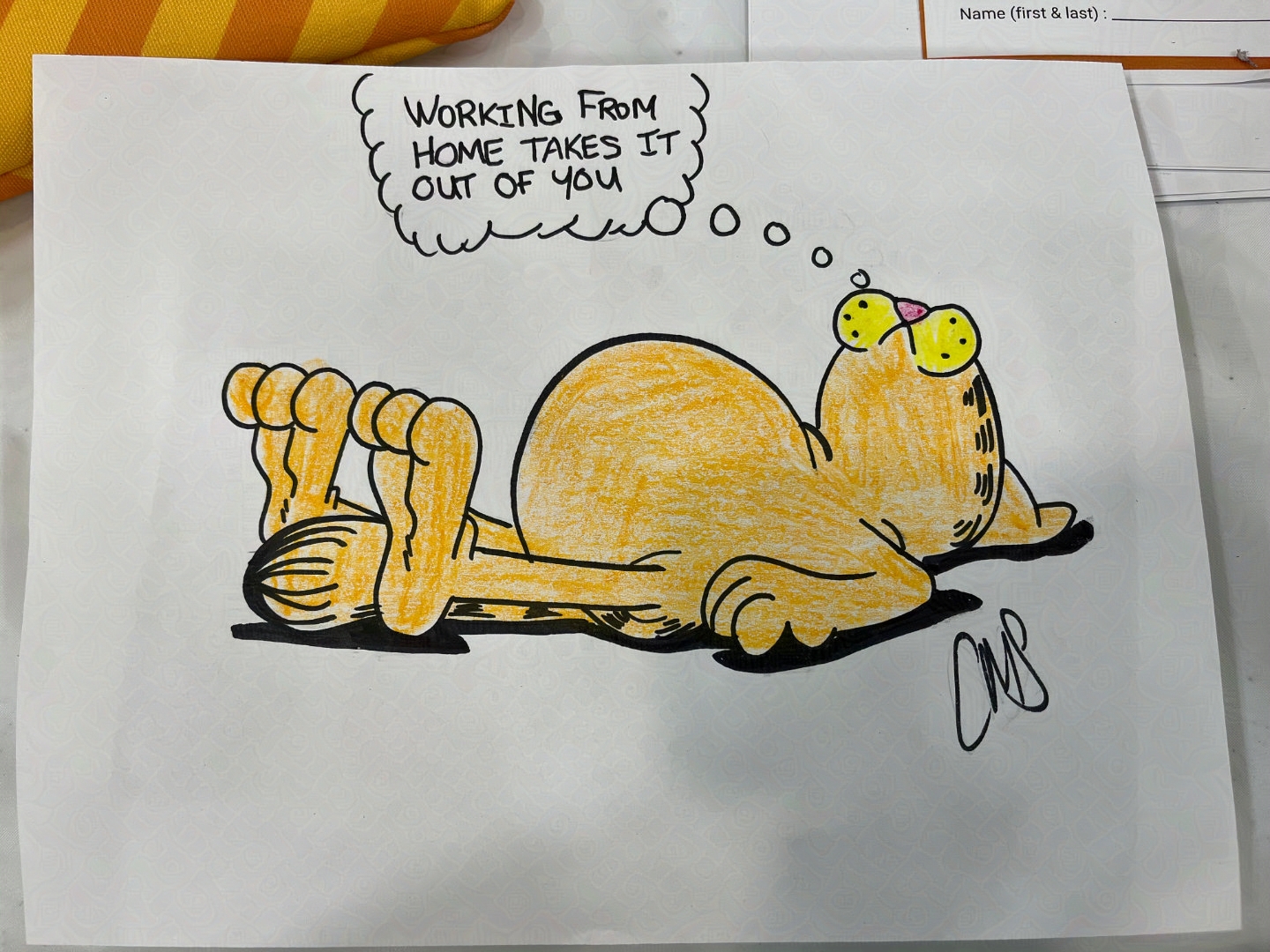 Crayon colored in drawing of garfield the cat laying down. text bubble reads "Working from home takes it out of you".