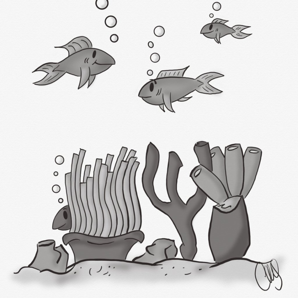 Fish swimming around near the bottom of the ocean by a coral reef.