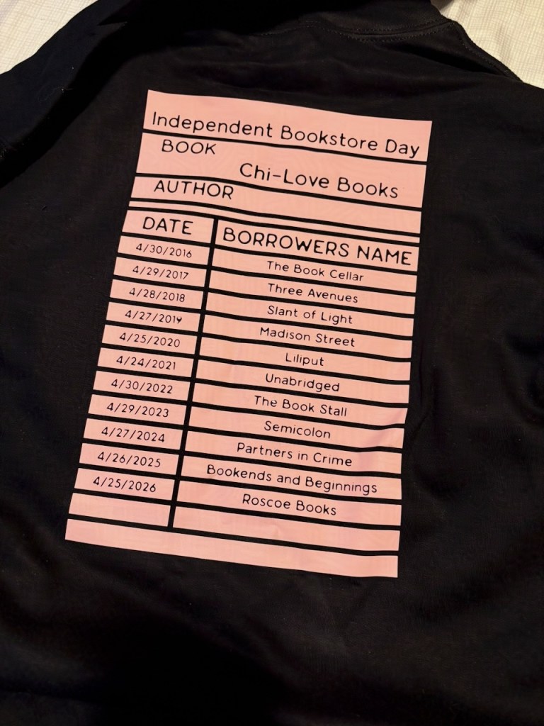 back of a shirt so you can see the library check out card design